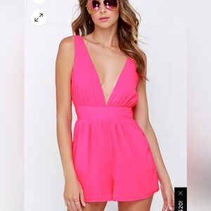Hot pink jumpsuit.